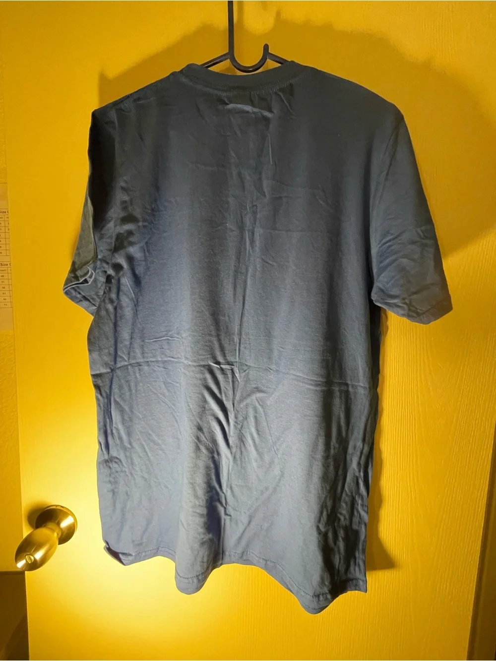 Threadless Blue Tee with Lime Green Cat and Brown Ball